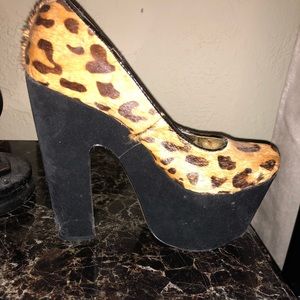 Black and leopard pumps